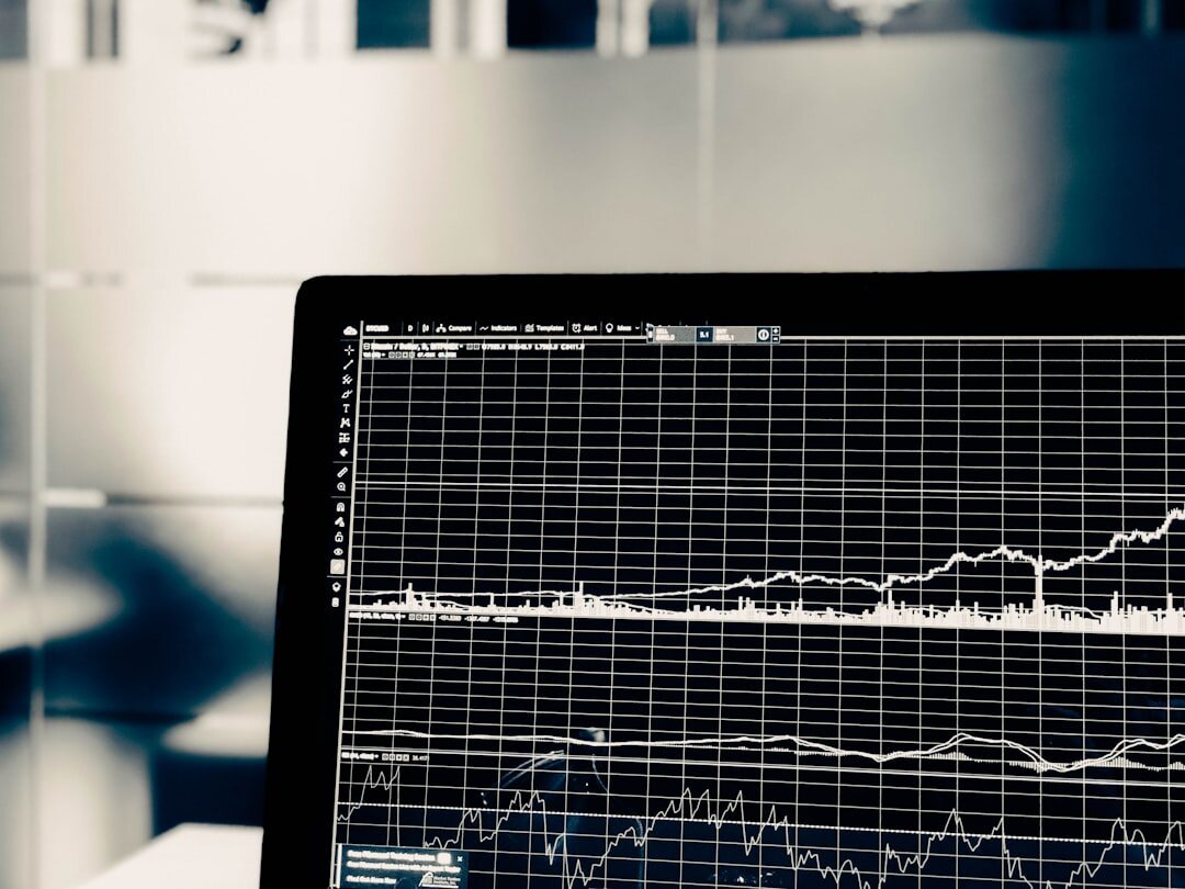 Data analytics dashboard with charts and graphs on screen